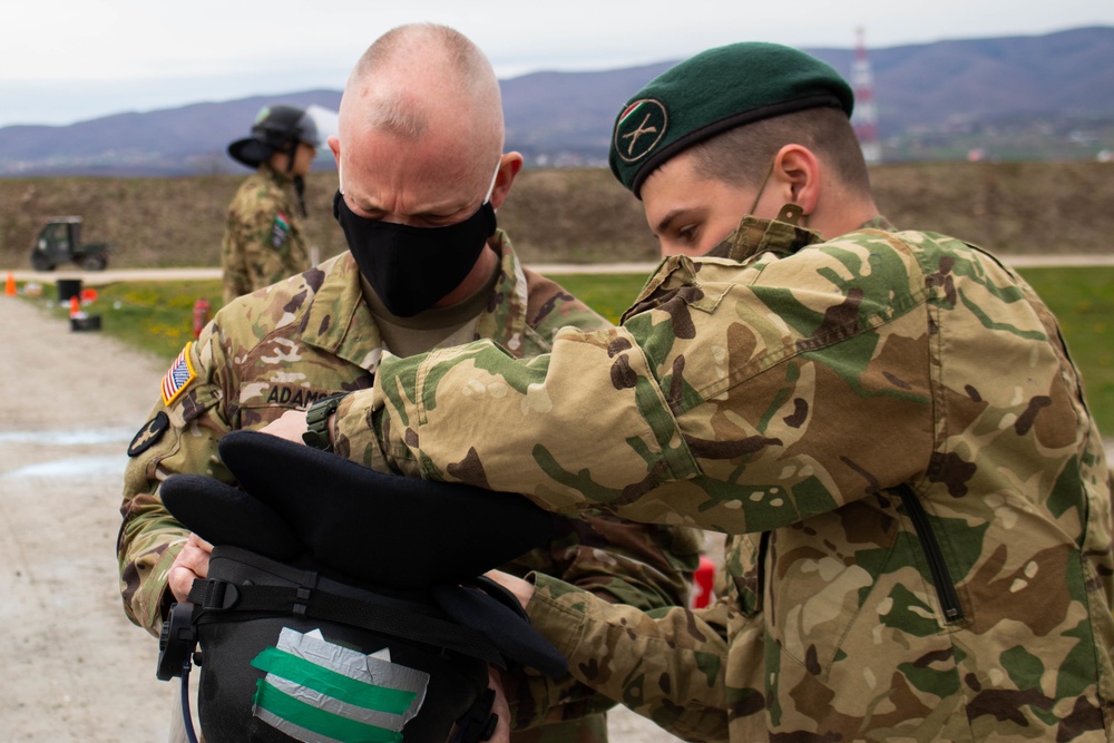 RC-E KFOR commander dons CRC helmet