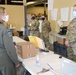 Photo of 116th Air Control Wing leadership visiting with Georgia National Guard Airmen, Soldiers and partner-agency personnel providing support at COVID-19 Vaccination Site