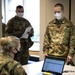 Airmen Attend In-Processing Briefings for Operation Safety Net Support