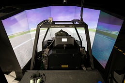 Marne Air Soldiers learn the newest version of the AH-64E Apache helicopter.