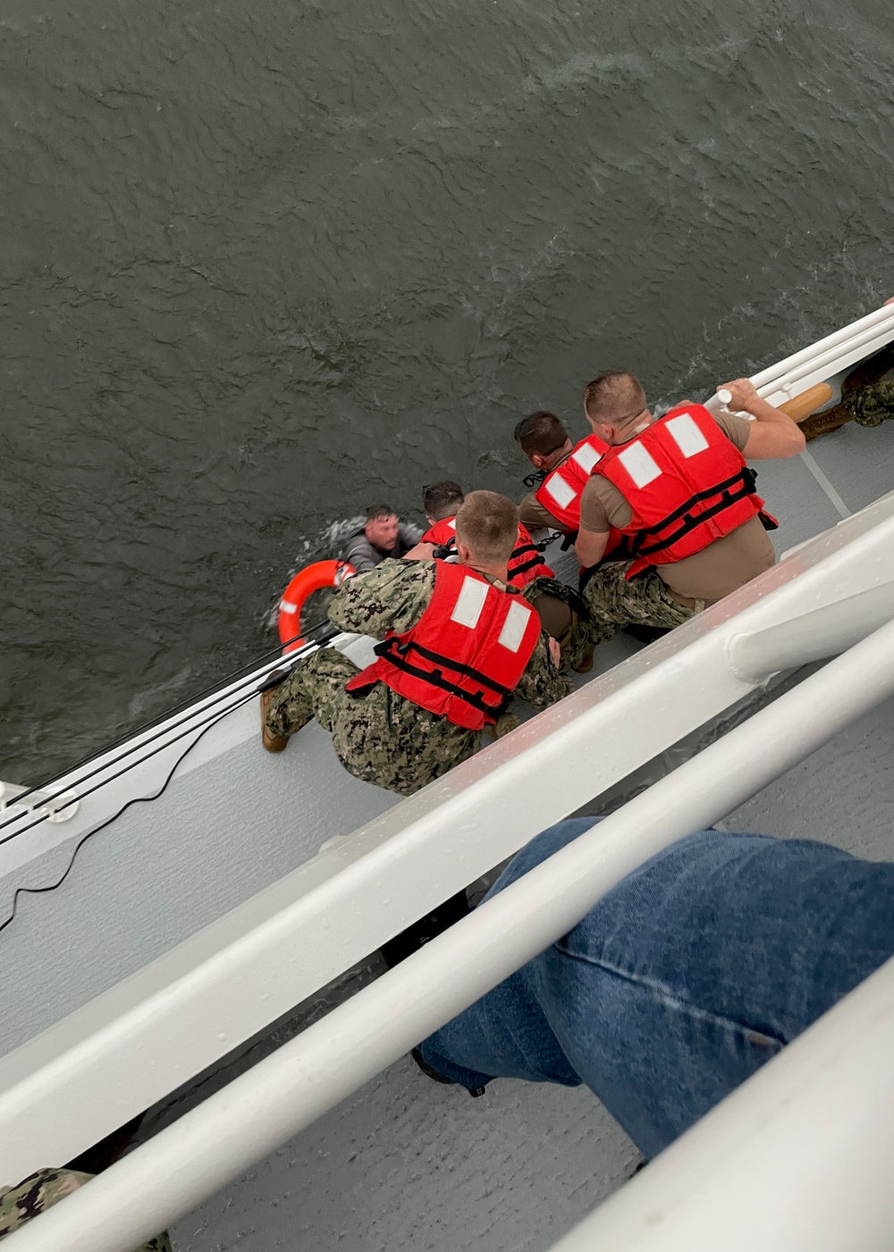 Coast Guard, good Samaritans rescue 6 people from capsized vessel 8 miles south of Grand Isle, searching for more