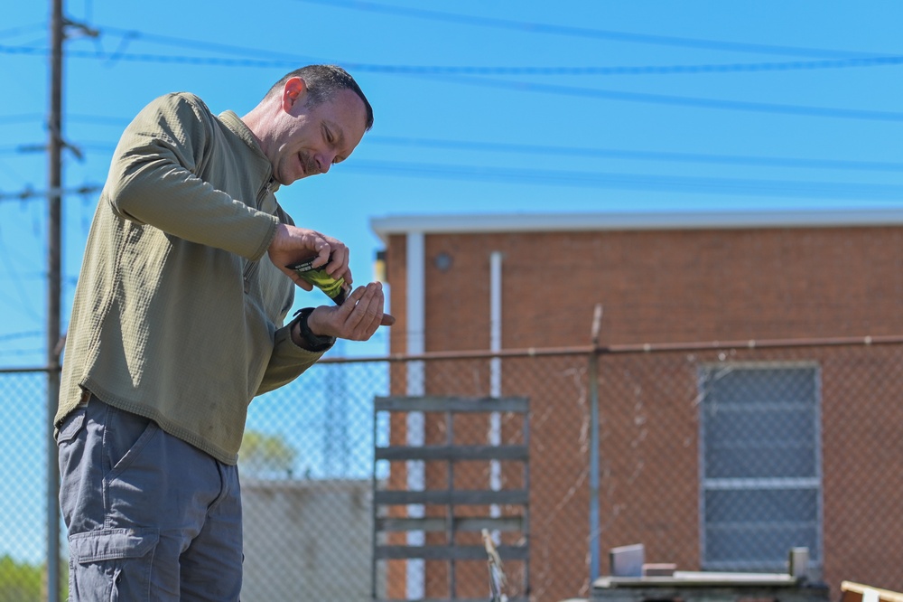 Illinois National Guard Service Member Volunteer Gardening Service in East St. Louis