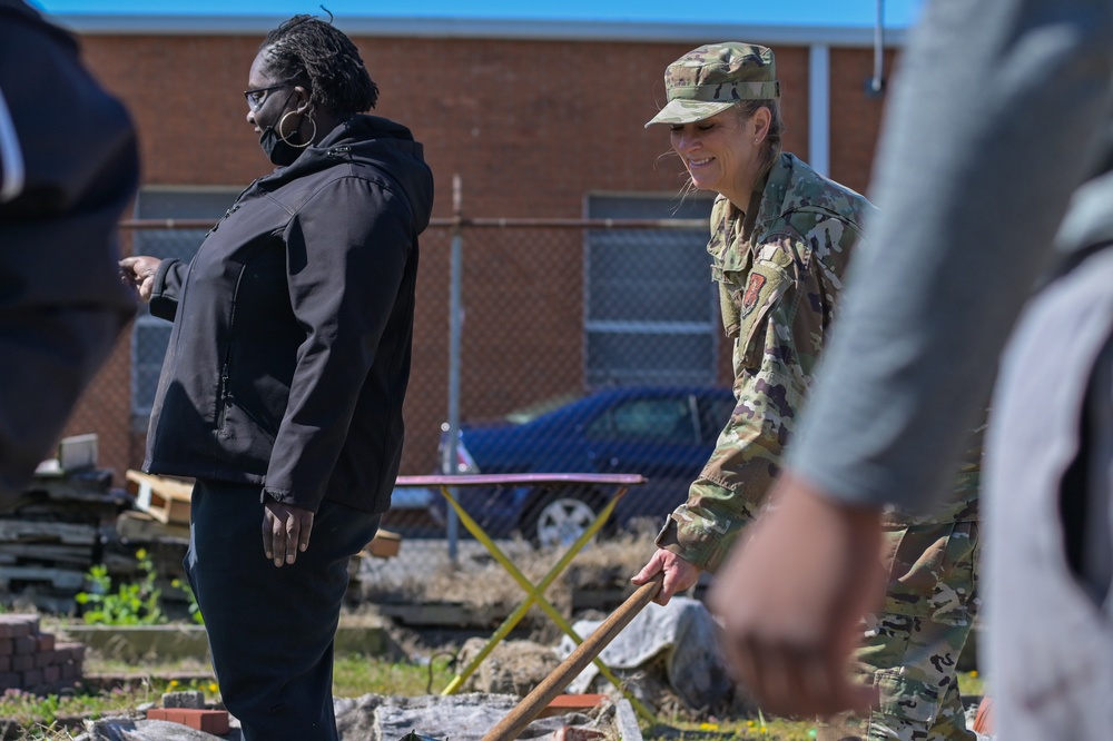 Illinois National Guard Service Member Volunteer Gardening Service in East St. Louis