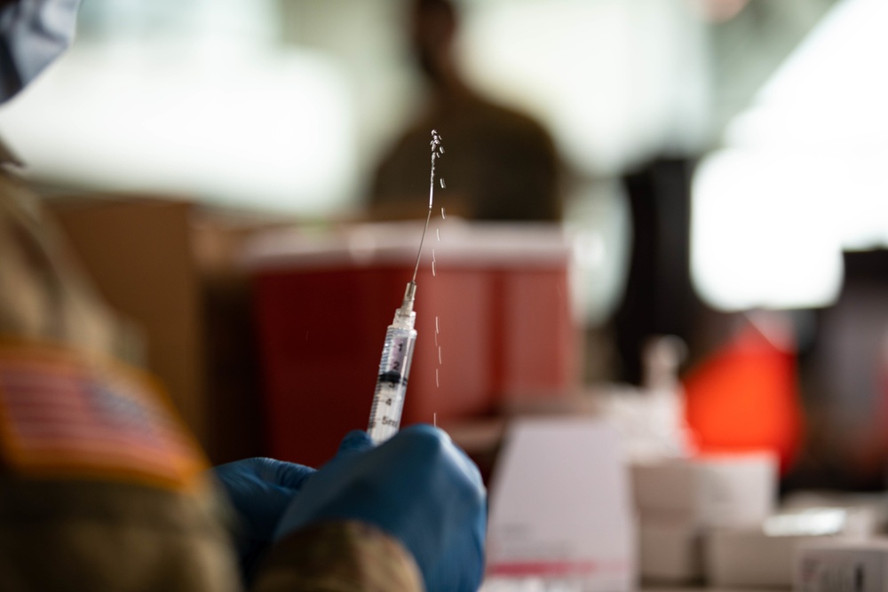 Department of Defense personnel give 100,000 COVID-19 vaccinations in Atlanta