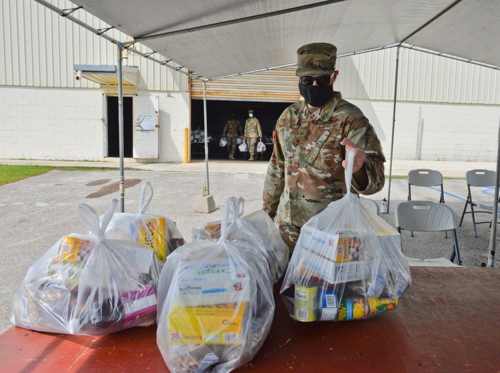 Andersen Airmen assist with Yona food distribution