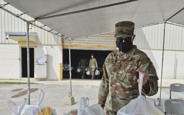 Andersen Airmen assist with Yona food distribution