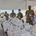 Andersen Airmen assist with Yona food distribution