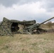 A Camouflaged Howitzer