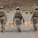 Marines clear obstacles with explosives