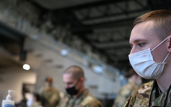 Airmen register community members at Ford Field CVC in Detroit