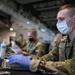 Airmen register community members at Ford Field CVC in Detroit
