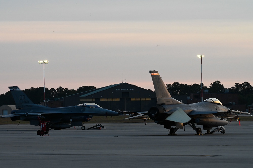 U.S. Air Force fighter jets park during sun rise during Sentry Savannah