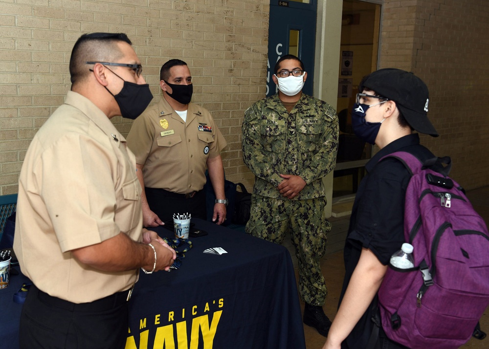 Brothers return to Alma Mater to speak with students about the Navy