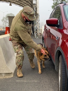 Chance and handler CW4 Joe Hall of California State Guard