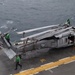 USS Iwo Jima Receives Replenishment-At-Sea