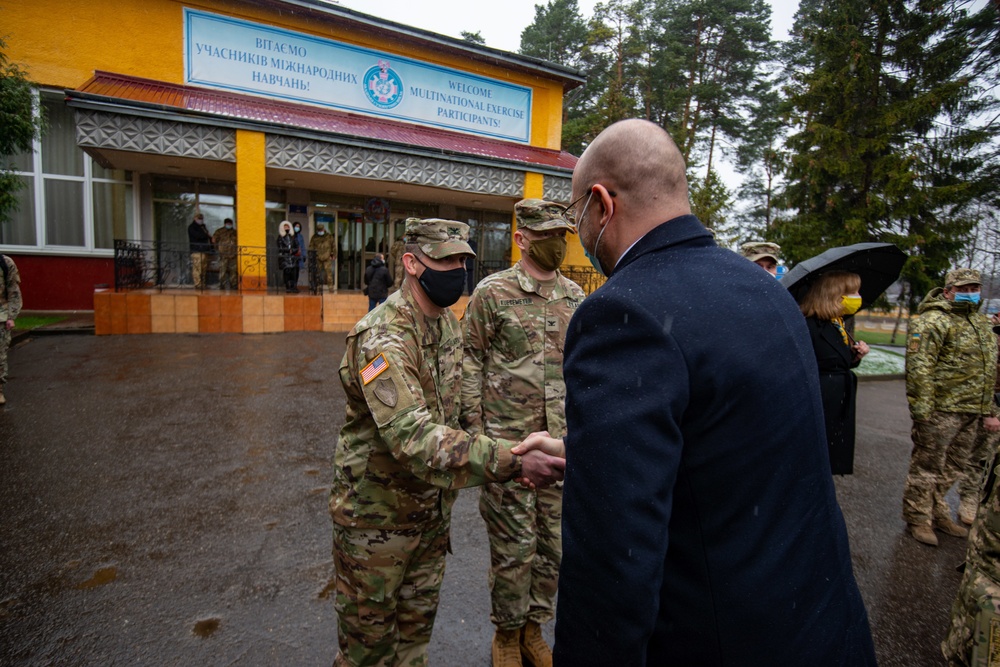 Col. James Perrin and Col. Clayton Kuetemeyer greet Ukraine Prime Minister Denys Shmyhal