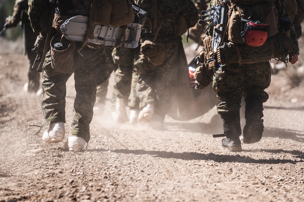 Marines and Sailors evacuate simulated casualties during MTX