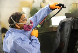 Army vehicles get camo’d up at the paint booth