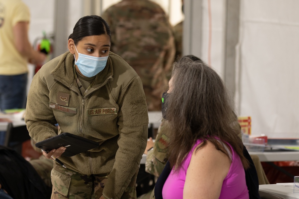 U.S. service members aid FEMA at the Greenbelt Metro CVC