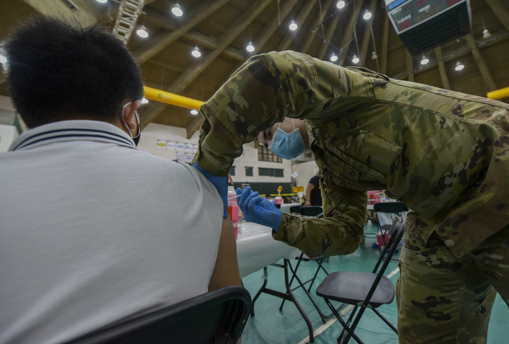 U.S. Army 25th Infantry Division Soldiers Administer Vaccines at Guam Department of Public Health and Social Services COVID-19 Vaccine Clinic