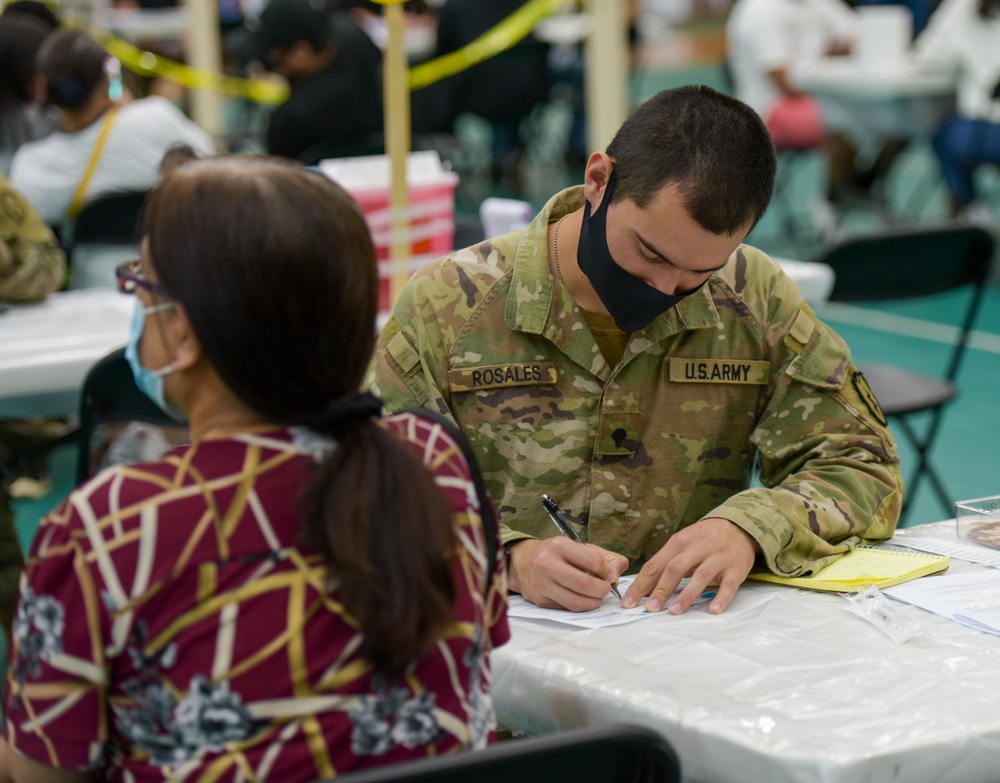 U.S. Army 25th Infantry Division Soldiers Administer Vaccines at Guam Department of Public Health and Social Services COVID-19 Vaccine Clinic