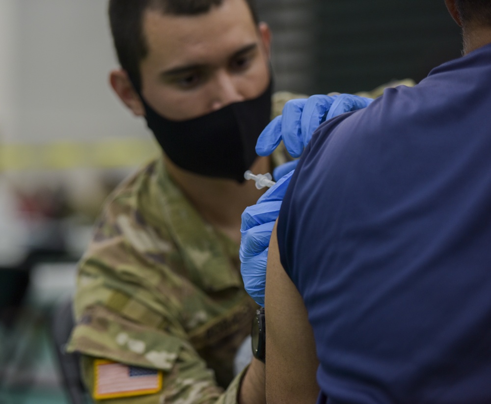 U.S. Army 25th Infantry Division Soldiers Administer Vaccines at Guam Department of Public Health and Social Services COVID-19 Vaccine Clinic