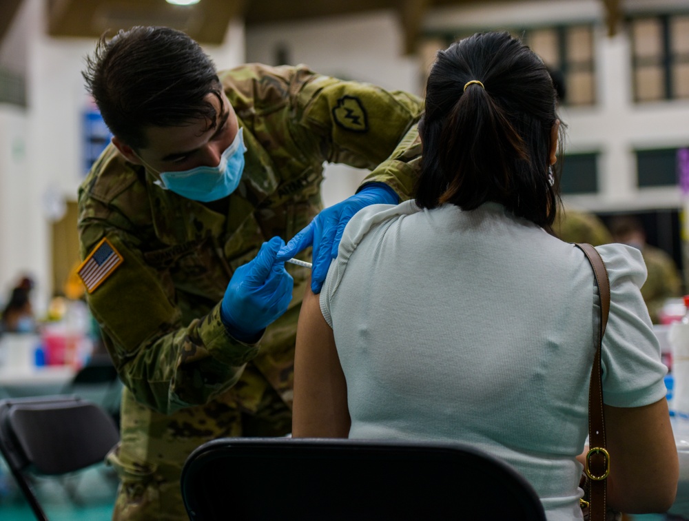 U.S. Army 25th Infantry Division Soldiers Administer Vaccines at Guam Department of Public Health and Social Services COVID-19 Vaccine Clinic