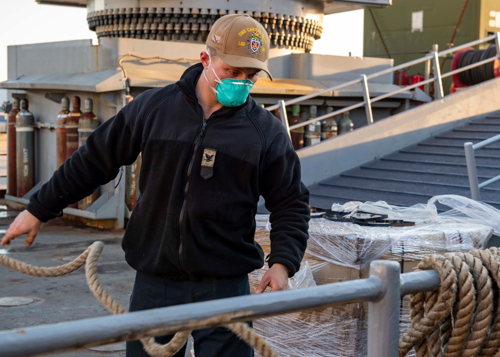 The Crew Aboard the Harpers Ferry-class Dock Landing Ship USS Carter Hall (LSD 50) Participates in a Field Day