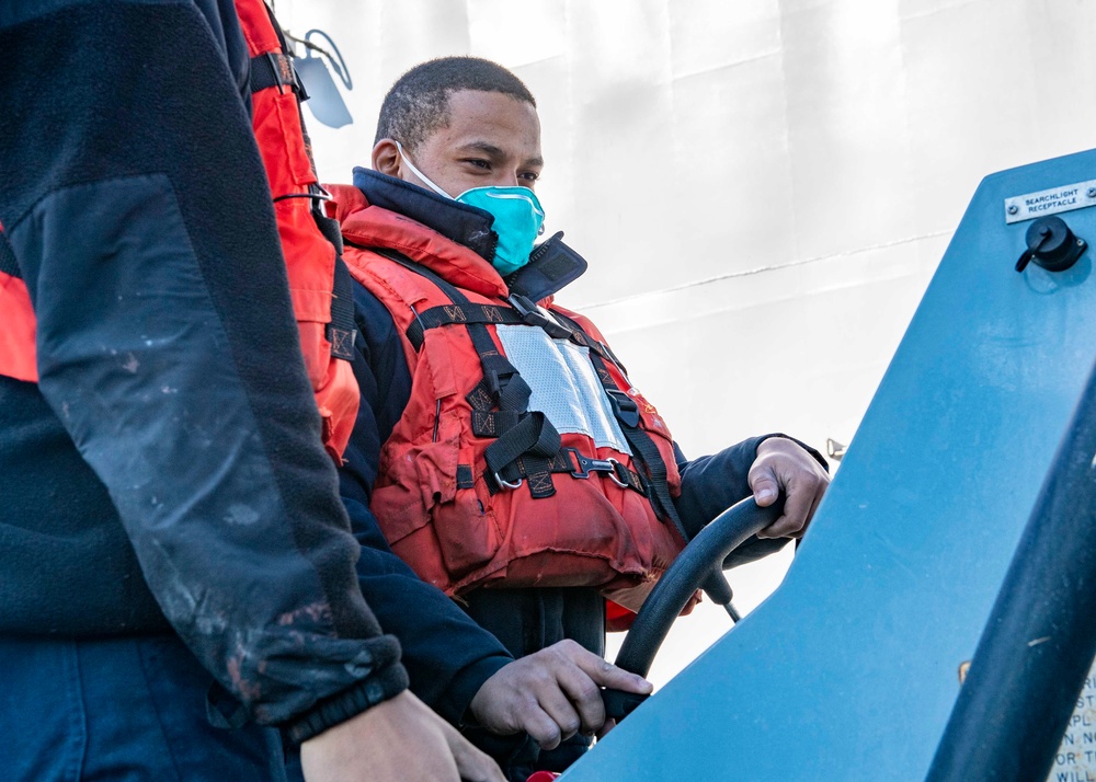USS Carter Hall Sailors Conduct Maintenance