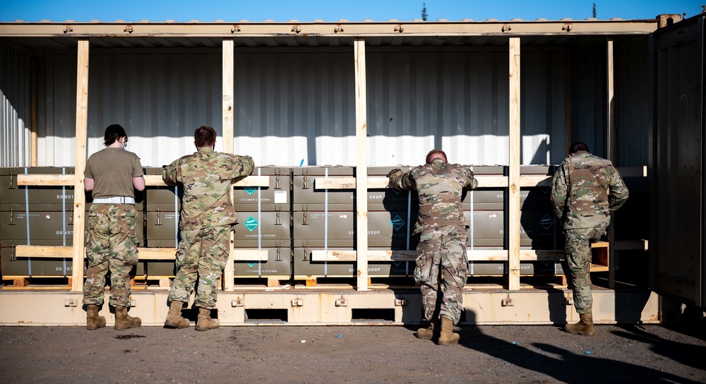 354th FW receives critical munitions from annual barge