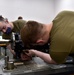 354th MXS Armament conduct maintenance on F-16 Fighting Falcon gun