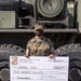 1st Transportation Battalion Marine receives check for Innovation Award