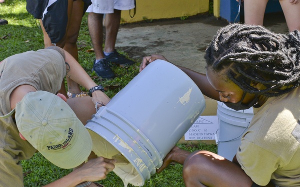 36th HCOS Airmen, mayor’s staff paint Agat bus stops