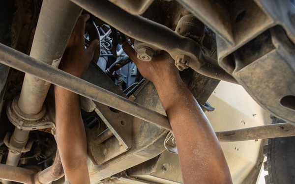 101st Division Sustainment Brigade Troops Perform Motor Pool Maintenance Checks