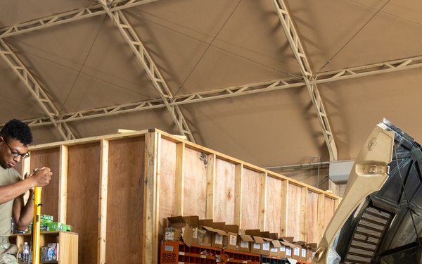 101st Division Sustainment Brigade Troops Perform Motor Pool Maintenance Checks