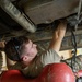 101st Division Sustainment Brigade Troops Perform Motor Pool Maintenance Checks