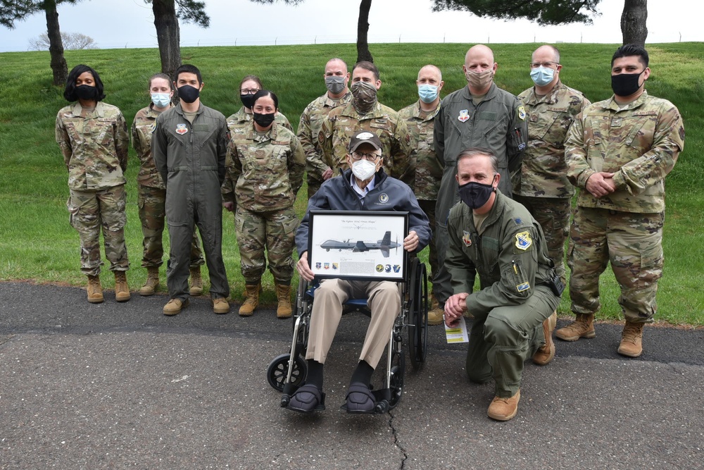 Centenarian pilot visits 103rd Attack Squadron