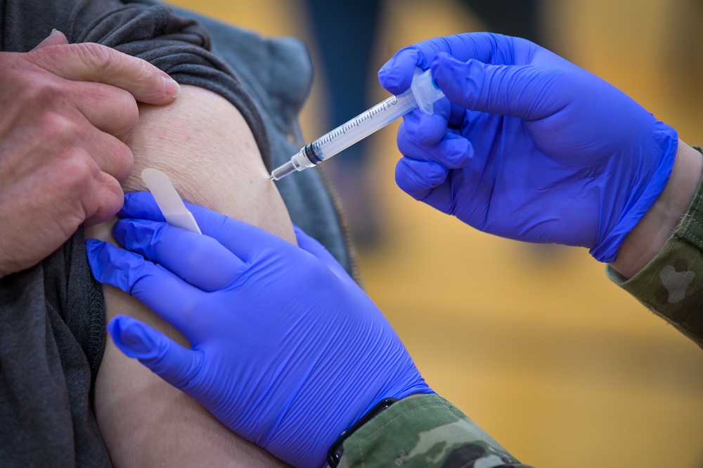 U.S. Air Force Staff Sgt. Victoria Goluszka Administers Vaccines To Illinois Residents