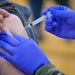 U.S. Air Force Staff Sgt. Victoria Goluszka Administers Vaccines To Illinois Residents