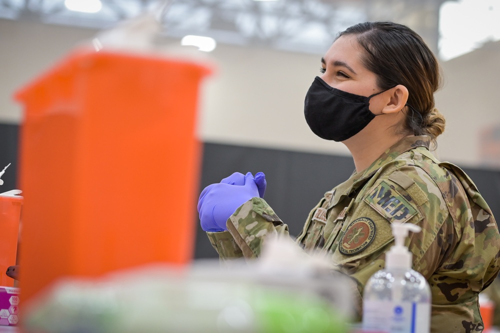 U.S. Air Force Staff Sgt. Victoria Goluszka Administers Vaccines To Illinois Residents