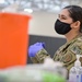 U.S. Air Force Staff Sgt. Victoria Goluszka Administers Vaccines To Illinois Residents