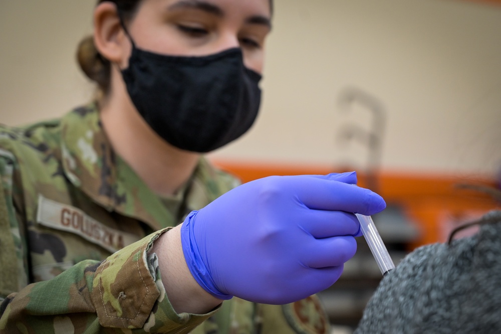 U.S. Air Force Staff Sgt. Victoria Goluszka Administers Vaccines To Illinois Residents