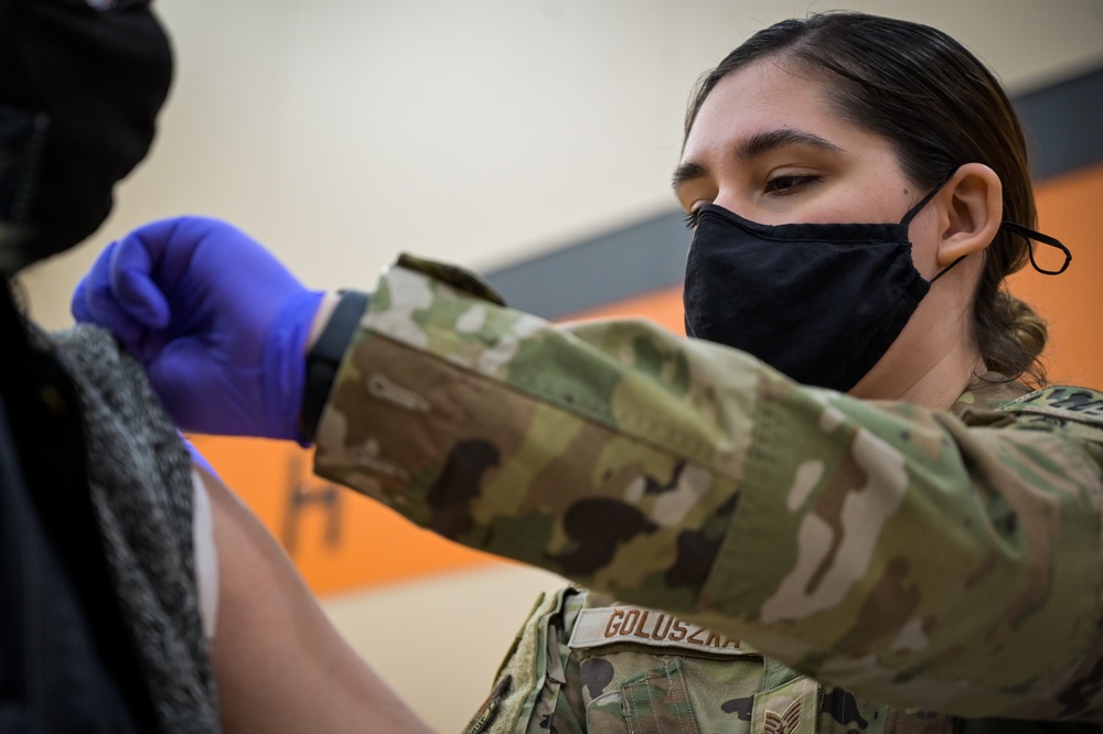 U.S. Air Force Staff Sgt. Victoria Goluszka Administers Vaccines To Illinois Residents