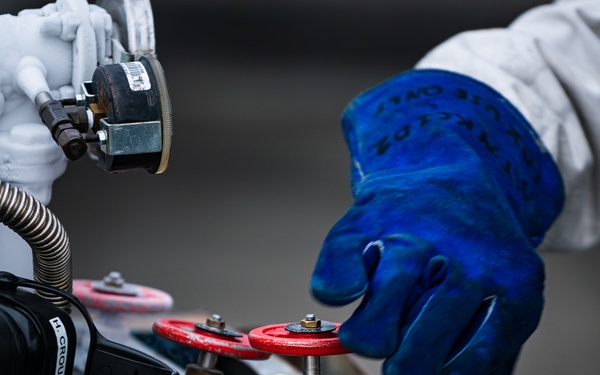 Airmen upload LOX for Hawgsmoke 2021