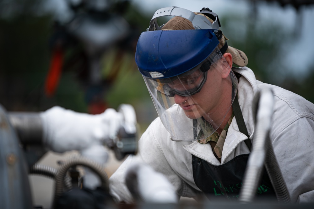 Airmen upload LOX for Hawgsmoke 2021