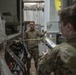 Missile handling technicians complete roll transfer during QA inspection