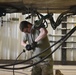 Missile handling technicians complete roll transfer during QA inspection