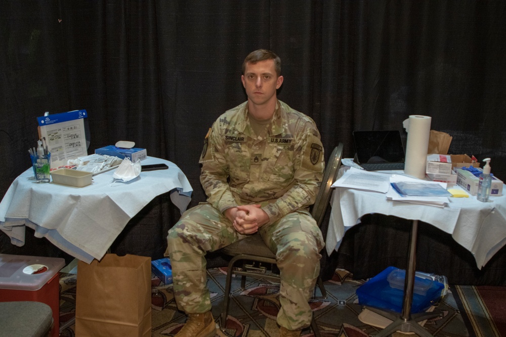 U.S. Army Staff Sgt. Christopher Sinclair talks about his role at the Wisconsin Center Community Vaccination Center