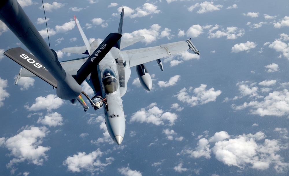 F/A-18C Hornet refuels with KC-135 Stratotanker