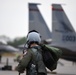A F-15 Eagle Fighter Pilot Steps to His Jet